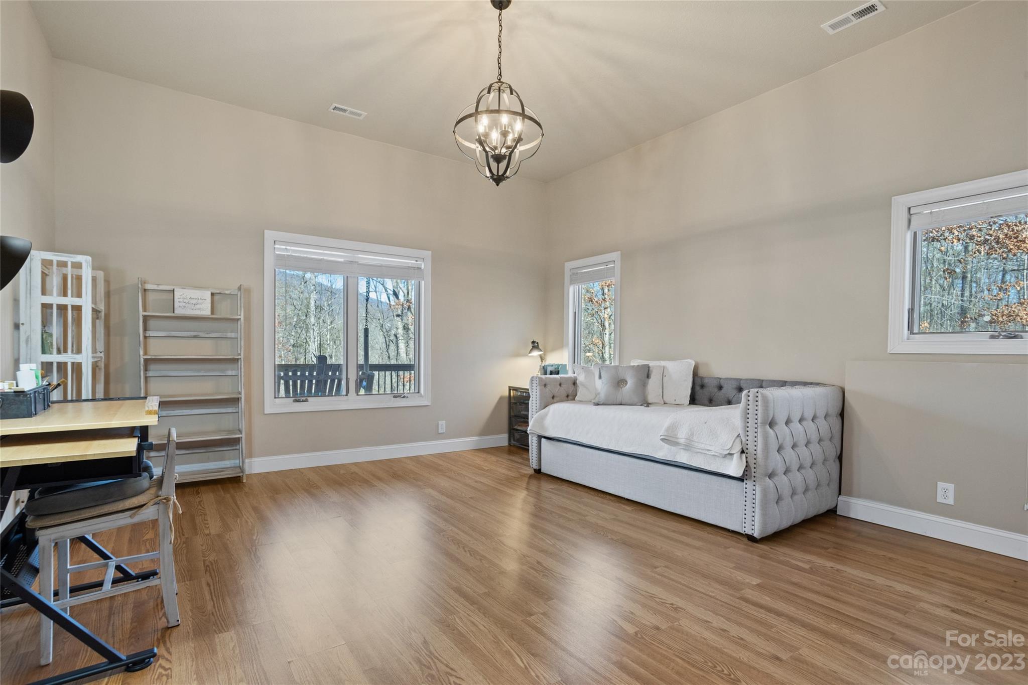 340 Highland View Lane Mill Spring, NC 28756 - Photo 34 of 48 a living room with furniture and a wooden floor