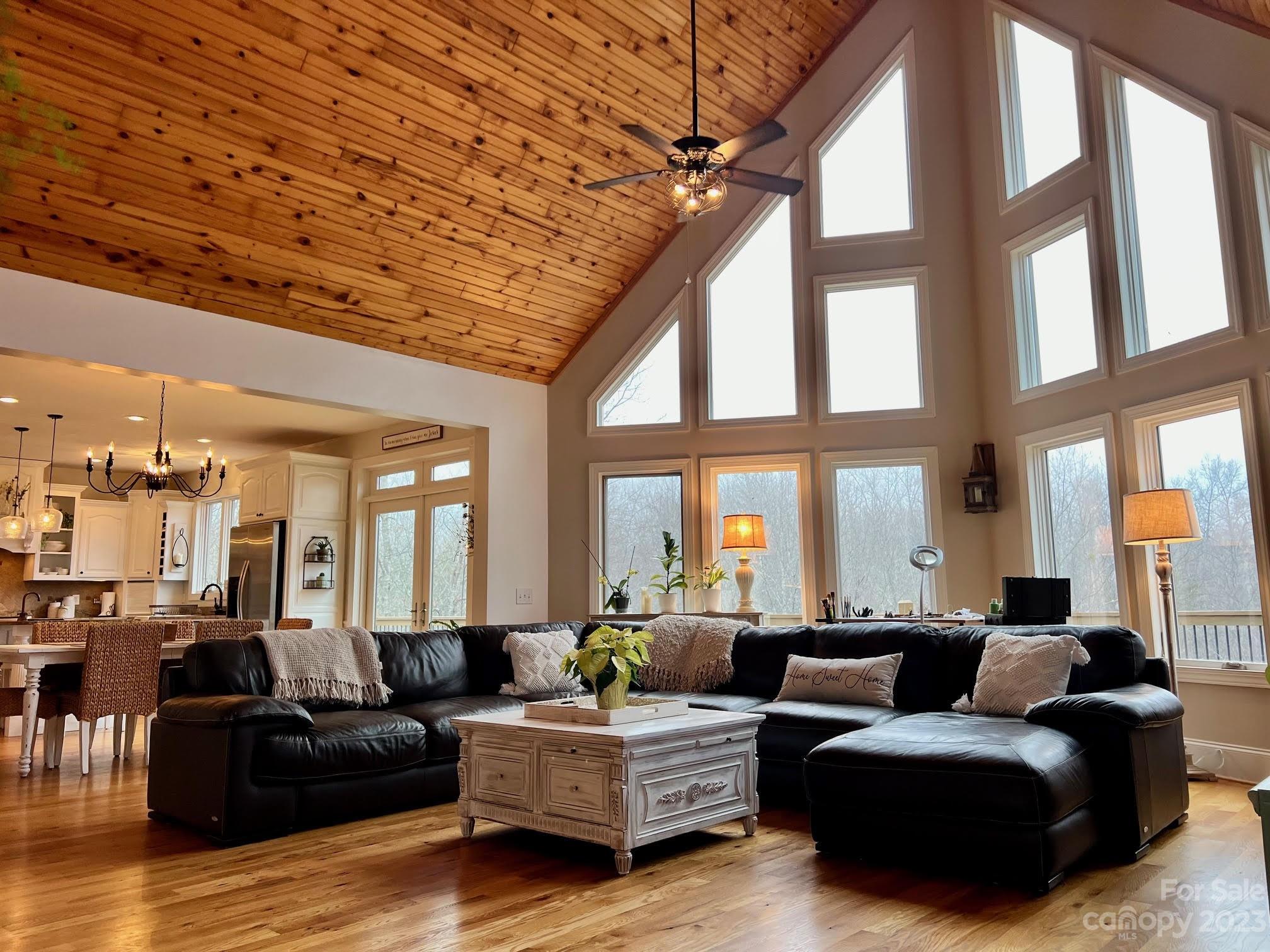 340 Highland View Lane Mill Spring, NC 28756 - Photo 42 of 48 a living room with furniture and a large window