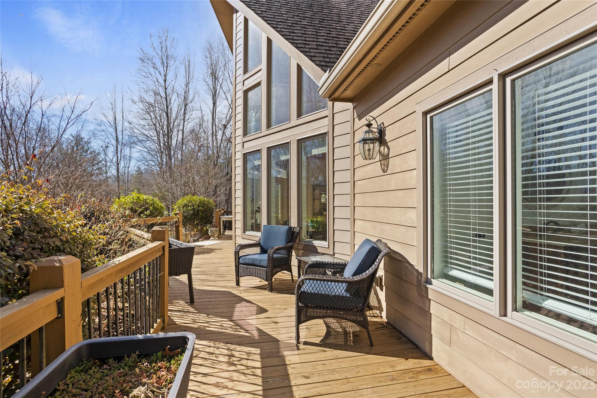 340 Highland View Lane Mill Spring, NC 28756 - Photo 8 of 48 a view of a patio with a table and chairs