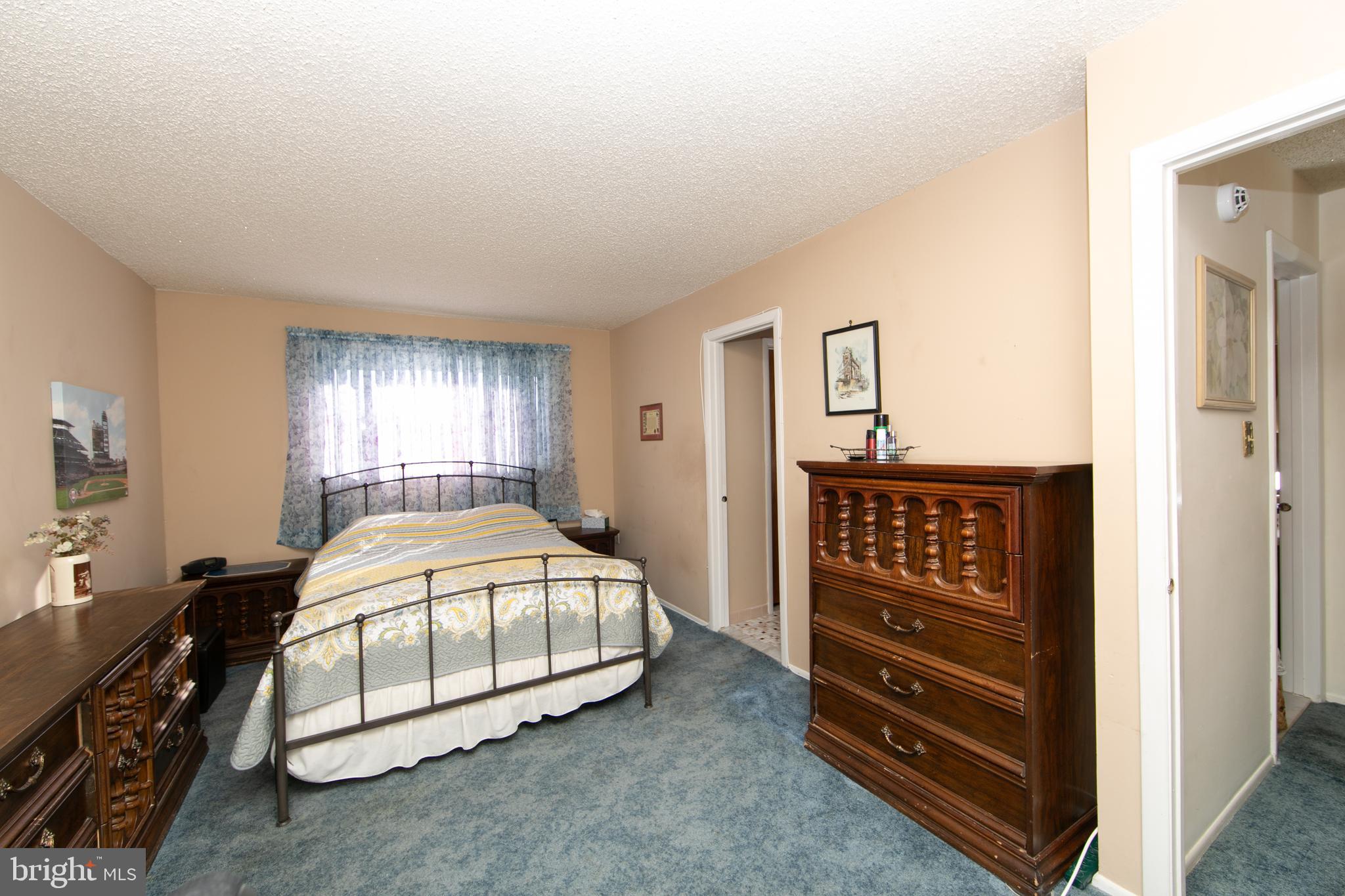 29 Chiswick Drive Lindenwold, NJ 08021 - Photo 16 of 26 a bedroom with a bed and a dresser
