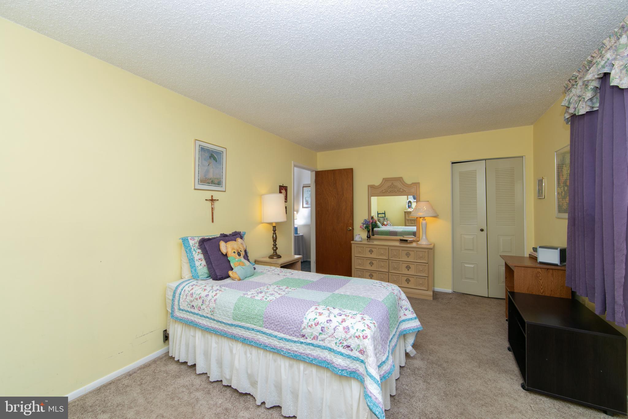 29 Chiswick Drive Lindenwold, NJ 08021 - Photo 23 of 26 a bedroom with a bed and wooden floor