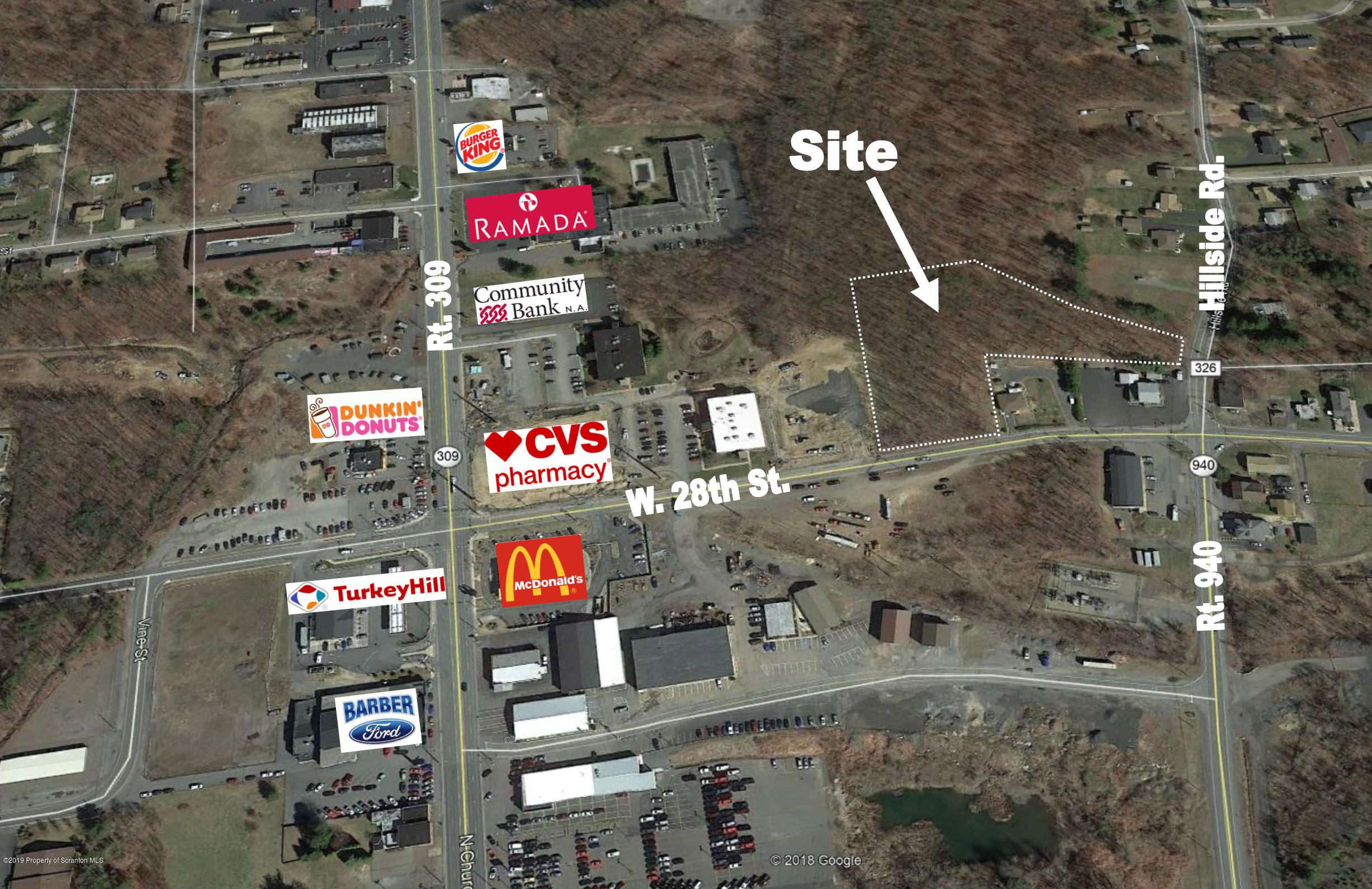 a street sign on a pole on a street