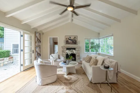 a kitchen with granite countertop cabinets stainless steel appliances and a sink