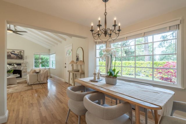 a kitchen with a stove top oven sink and cabinets