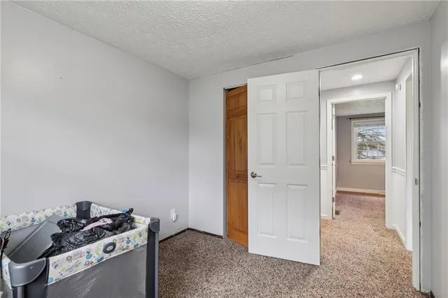 a room that has a lot of cabinets