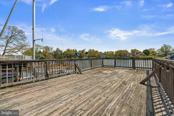 a view of a roof deck with couches