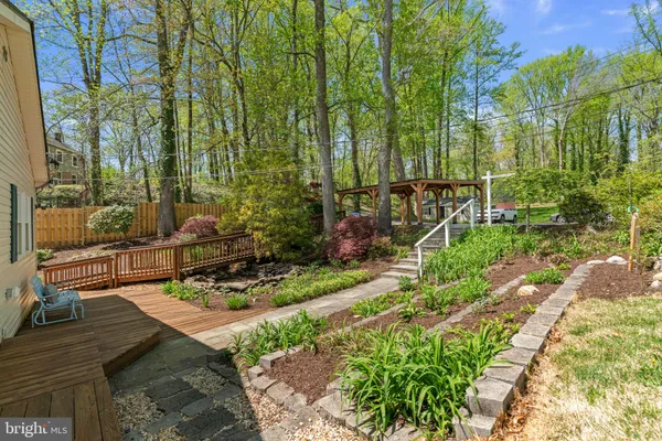 a view of a backyard with sitting area