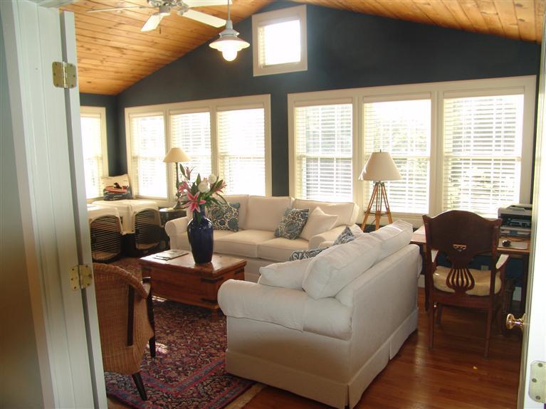 65 Bay Shore Road Hyannis, MA 02601 - Photo 12 of 35 a living room with furniture and large windows