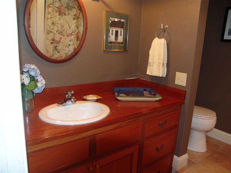 65 Bay Shore Road Hyannis, MA 02601 - Photo 29 of 35 a bathroom with a sink and a mirror