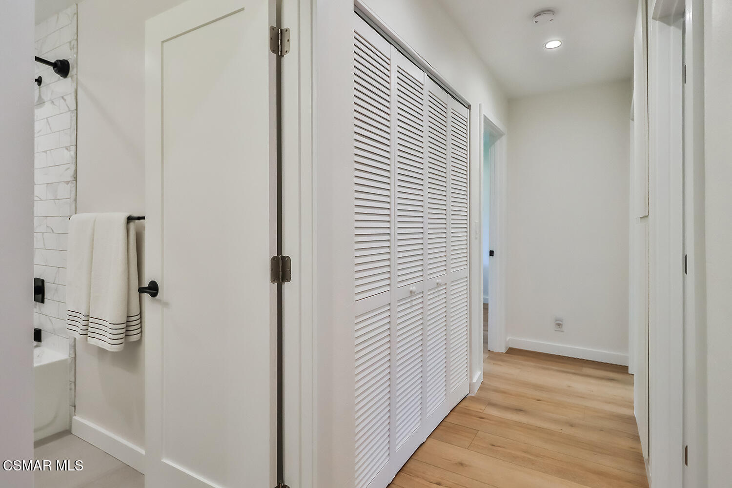 775 Ashland Avenue Simi Valley, CA 93065 - Photo 17 of 36 a view of a hallway with wooden floor and closet area