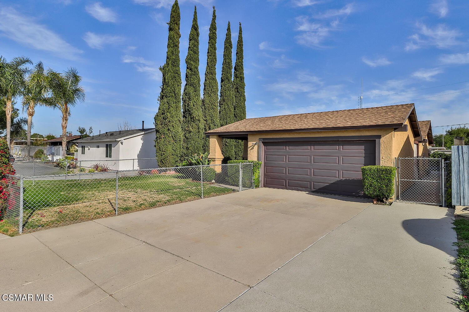 775 Ashland Avenue Simi Valley, CA 93065 - Photo 2 of 36 a front view of a house with a yard and potted plants