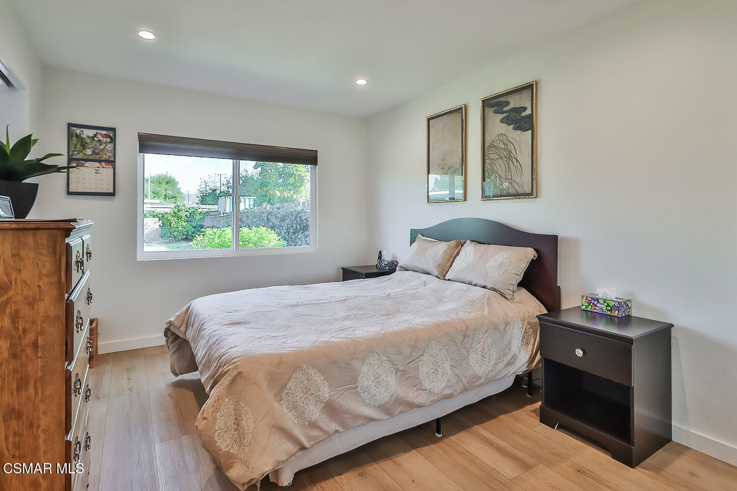 775 Ashland Avenue Simi Valley, CA 93065 - Photo 24 of 36 a bed sitting in a bedroom next to a window