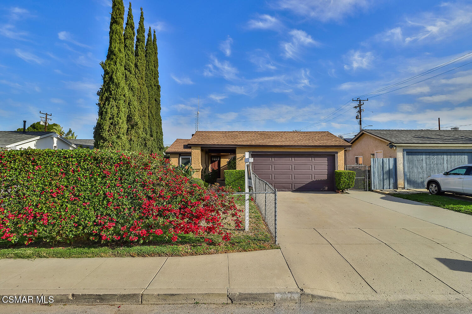775 Ashland Avenue Simi Valley, CA 93065 - Photo 3 of 36 a front view of a house with a garden