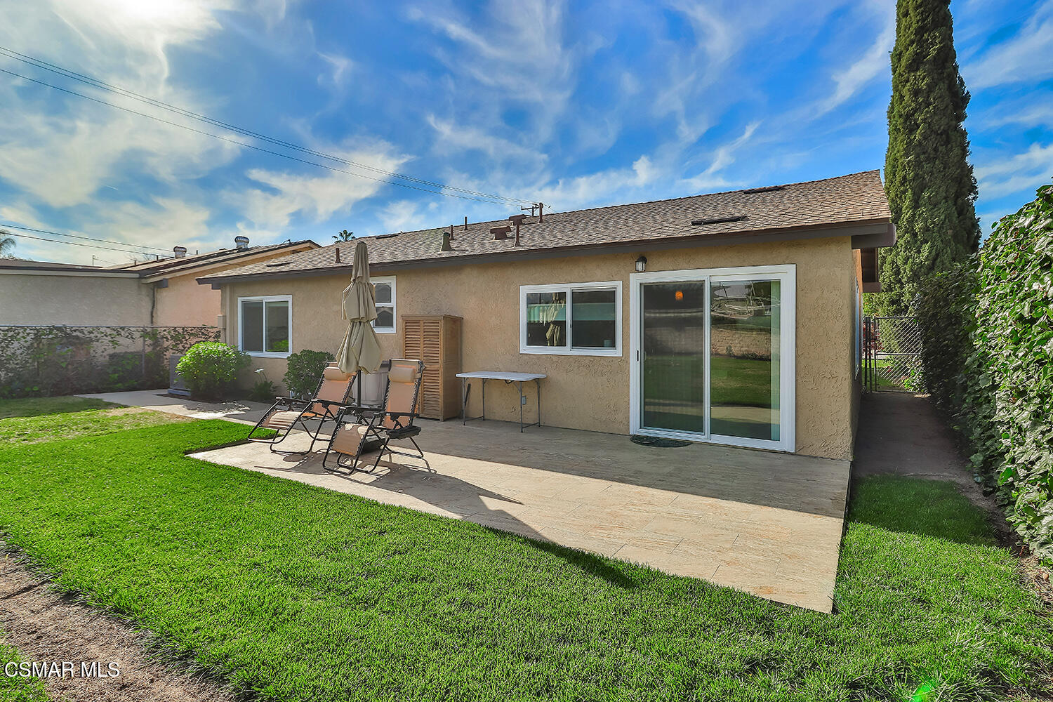 775 Ashland Avenue Simi Valley, CA 93065 - Photo 35 of 36 a view of a backyard with a sitting area and garden