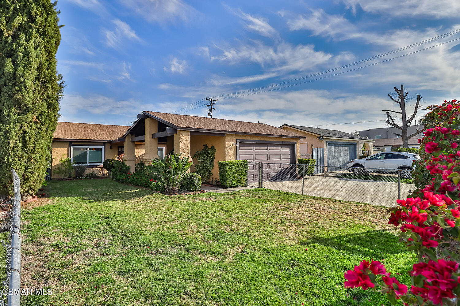 775 Ashland Avenue Simi Valley, CA 93065 - Photo 4 of 36 a view of a house with a big yard and potted plants