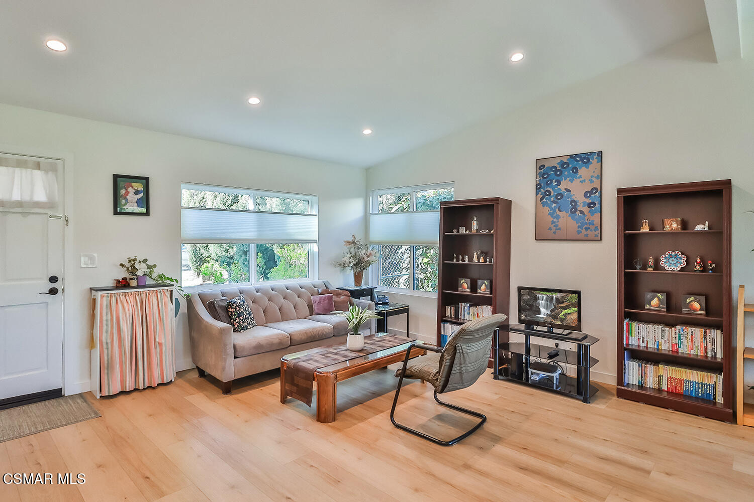 775 Ashland Avenue Simi Valley, CA 93065 - Photo 10 of 36 a living room with furniture and a wooden floor