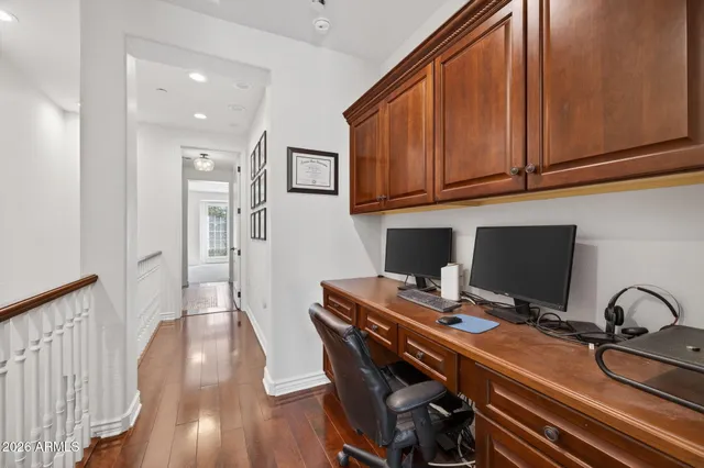 a kitchen with granite countertop stainless steel appliances and wooden cabinets