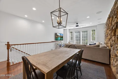a open kitchen with a table and chairs