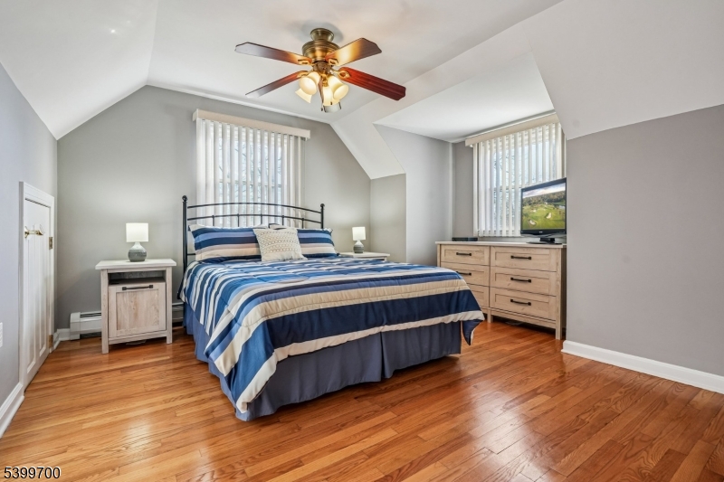 436 Mt Airy Road Bernards, NJ 07920 - Photo 13 of 20 a bedroom with a bed and a window