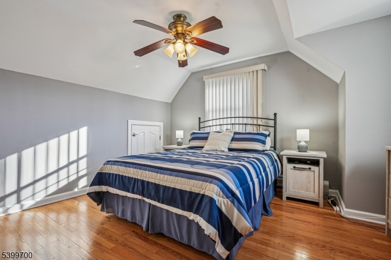 436 Mt Airy Road Bernards, NJ 07920 - Photo 14 of 20 a bedroom with a bed and a chandelier