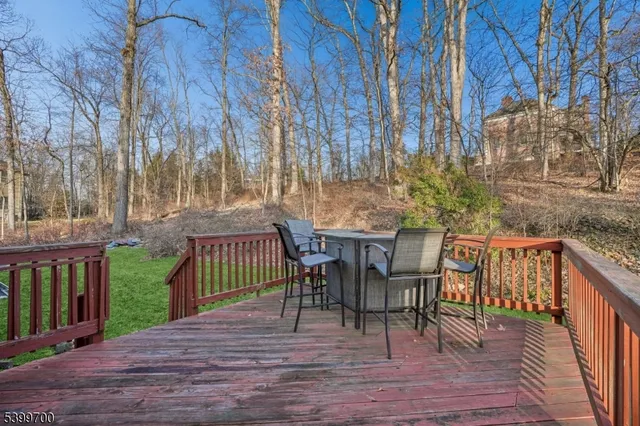 a view of a chairs and table on the wooden floor