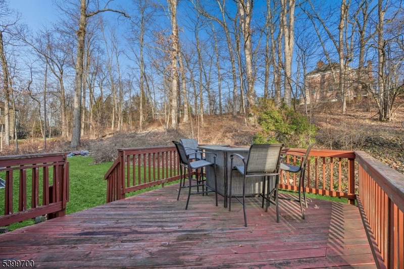 436 Mt Airy Road Bernards, NJ 07920 - Photo 18 of 20 a view of a chairs and table on the wooden floor