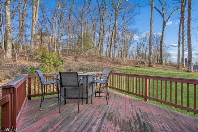 a view of a chairs and table on the wooden floor