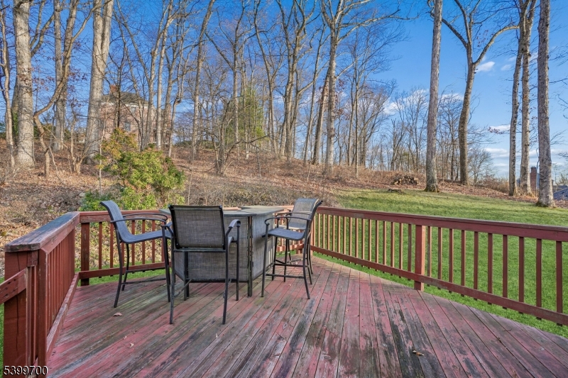 436 Mt Airy Road Bernards, NJ 07920 - Photo 19 of 20 a view of a chairs and table on the wooden floor