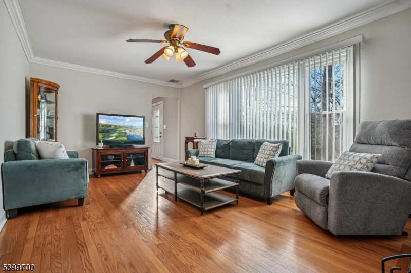 436 Mt Airy Road Bernards, NJ 07920 - Photo 2 of 20 a living room with furniture and a flat screen tv