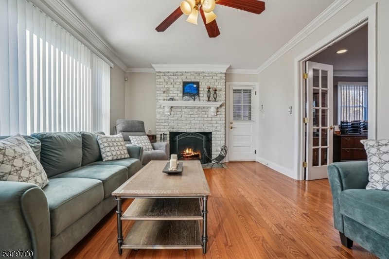 436 Mt Airy Road Bernards, NJ 07920 - Photo 3 of 20 a living room with furniture and a fireplace