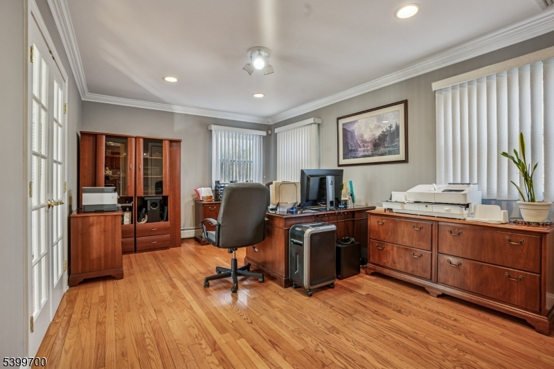 436 Mt Airy Road Bernards, NJ 07920 - Photo 9 of 20 a view of workspace with wooden floor and furniture