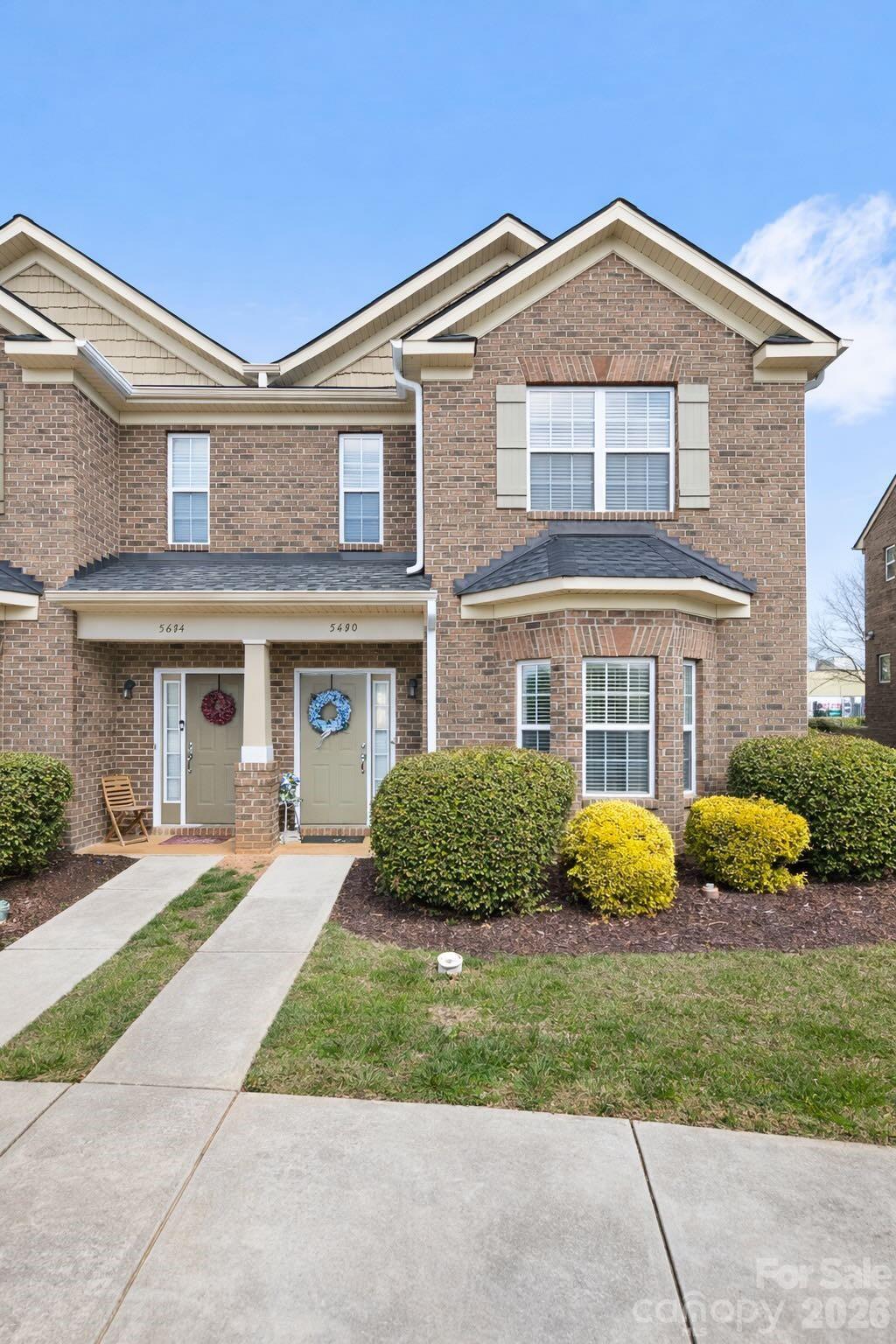 5670 Stafford Road Charlotte, NC 28215 - Photo 2 of 14 a front view of a house with a yard
