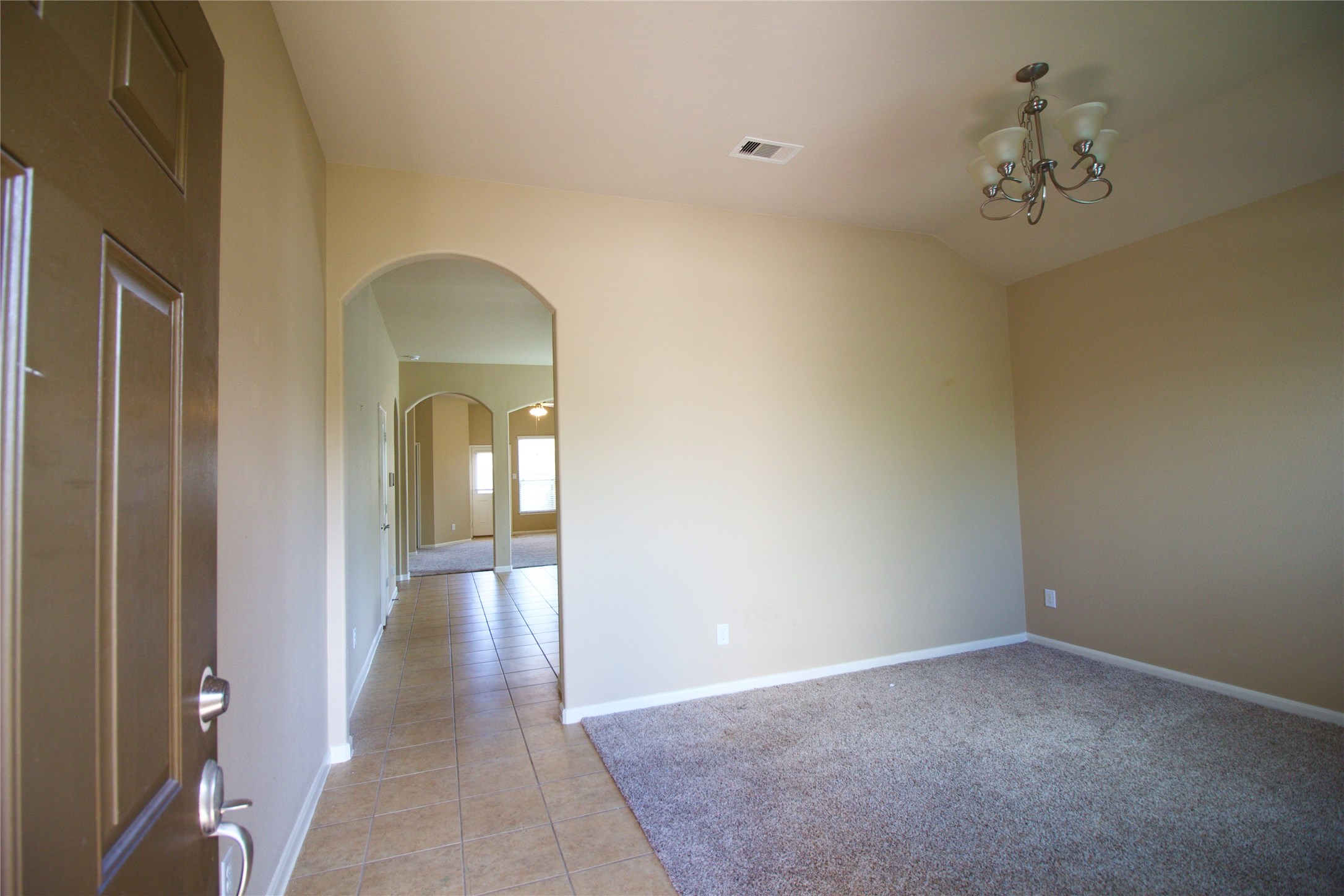 25311 Saddlebrook Ranch Drive Tomball, TX 77375 - Photo 7 of 30 Welcome home! This flex room/space can be used as formal dining or office/studio.