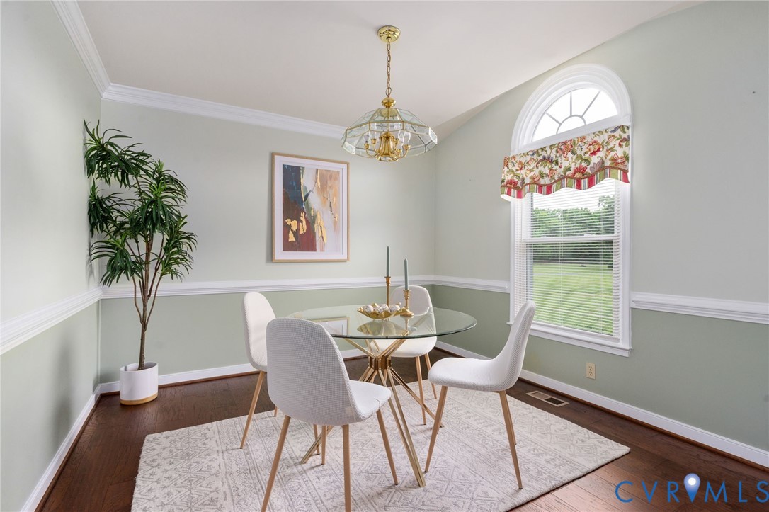 16379 Arch Hill Road Hanover, VA 23069 - Photo 6 of 26 a dining room with furniture a chandelier and window