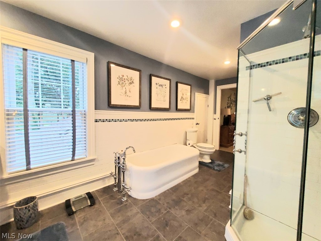 12703 Sheldon Road Mantua, OH 44255 - Photo 25 of 35 Another view in the custom full bath on the second level. Next to the toilet is a door that leads into the walk-in attic where there is plenty of storage.