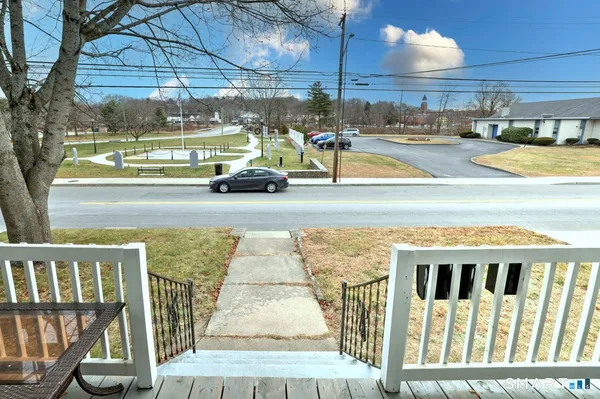 a view of a swimming pool and an outdoor space