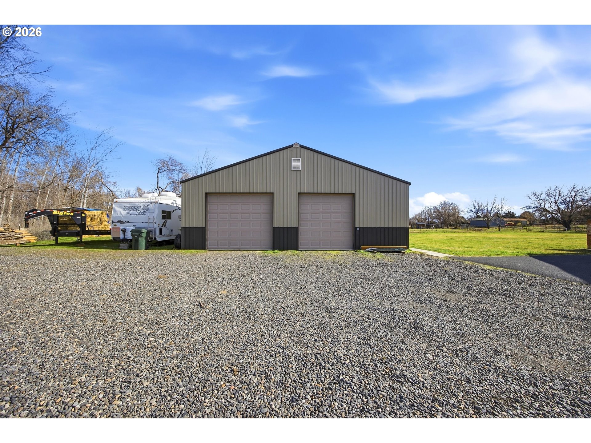 495 Second Street West Irrigon, OR 97844 - Photo 25 of 34 a view of a house with a swimming pool and a yard