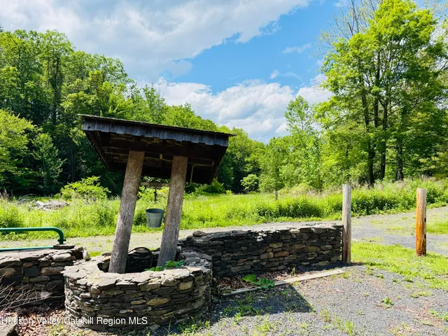 a view of a backyard with wooden floor