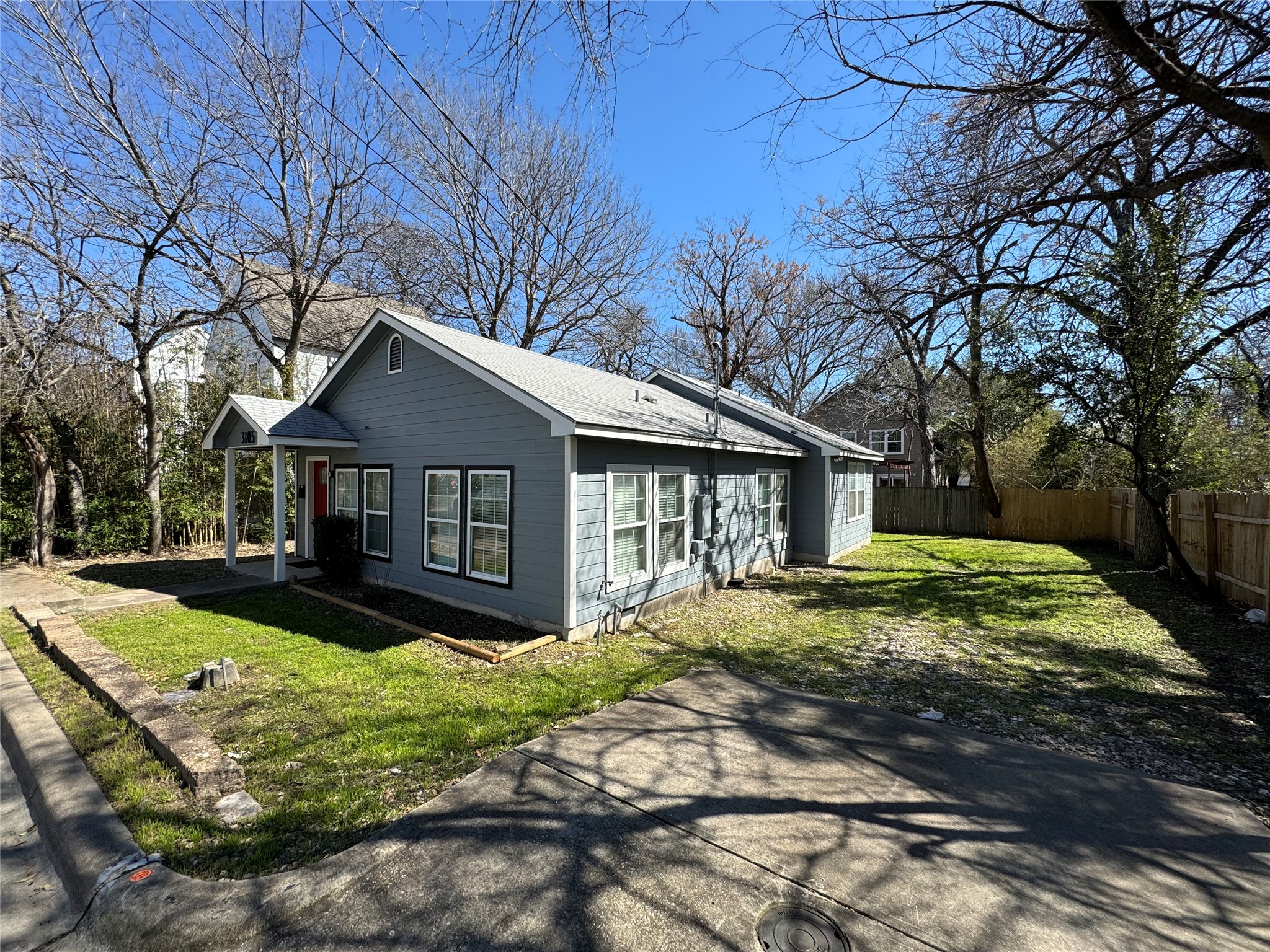 3105 Kings Lane Austin, TX 78705 - Photo 2 of 12 a view of house with a yard