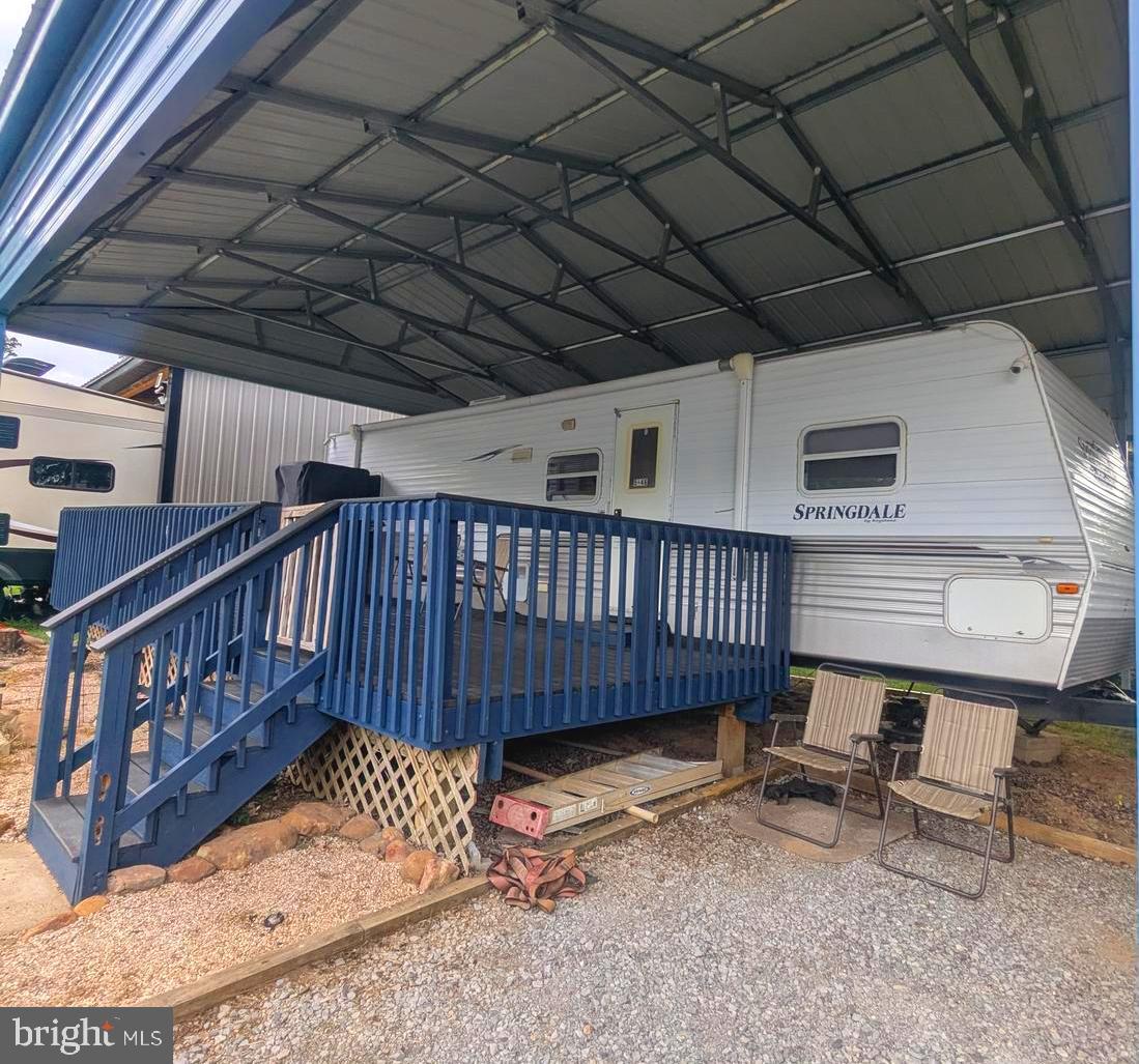 a view of a backyard with a deck