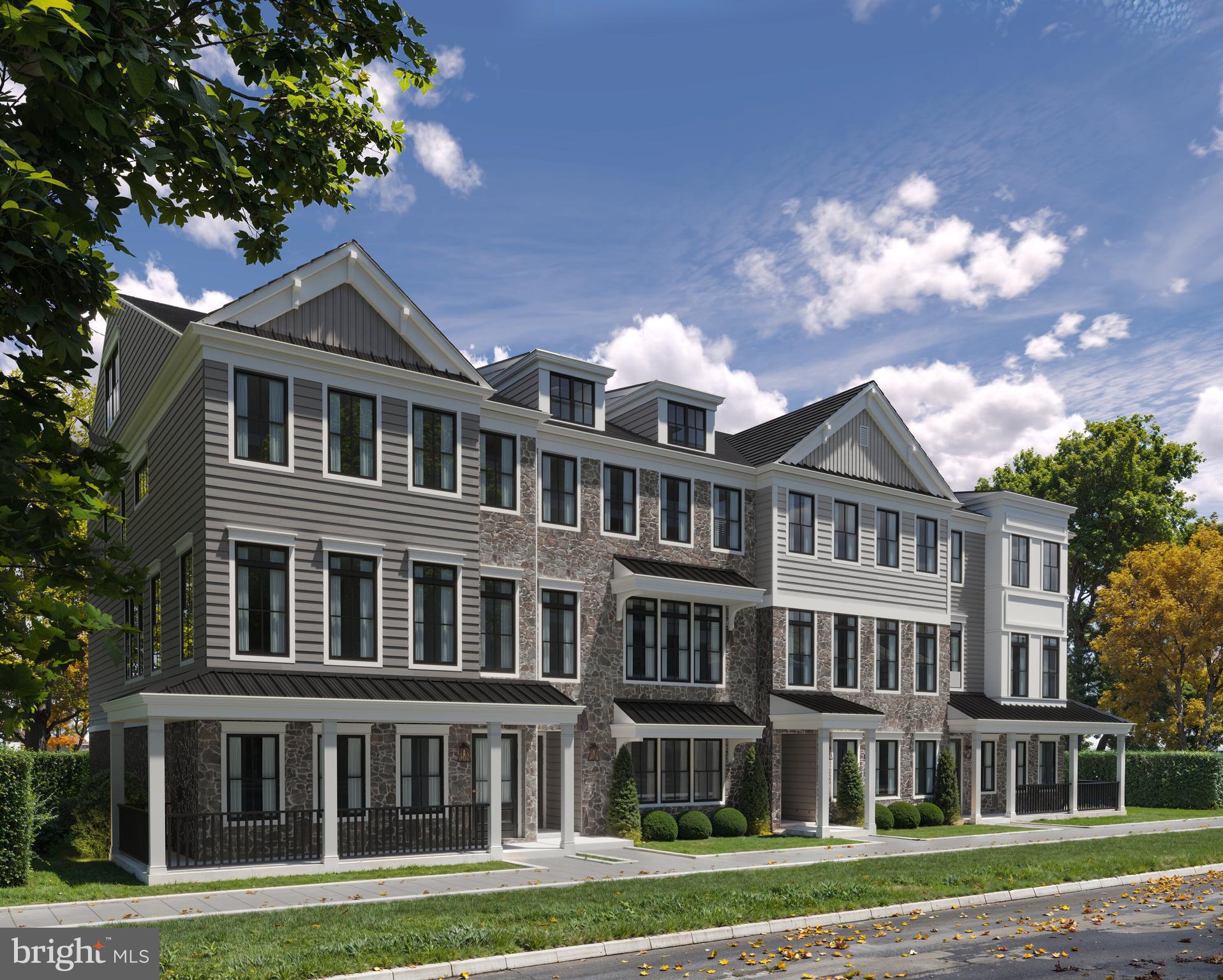403 Pennybrook Court, Unit 2 Flourtown, PA 19031 - Photo 1 of 19 a front view of a residential apartment building with a yard