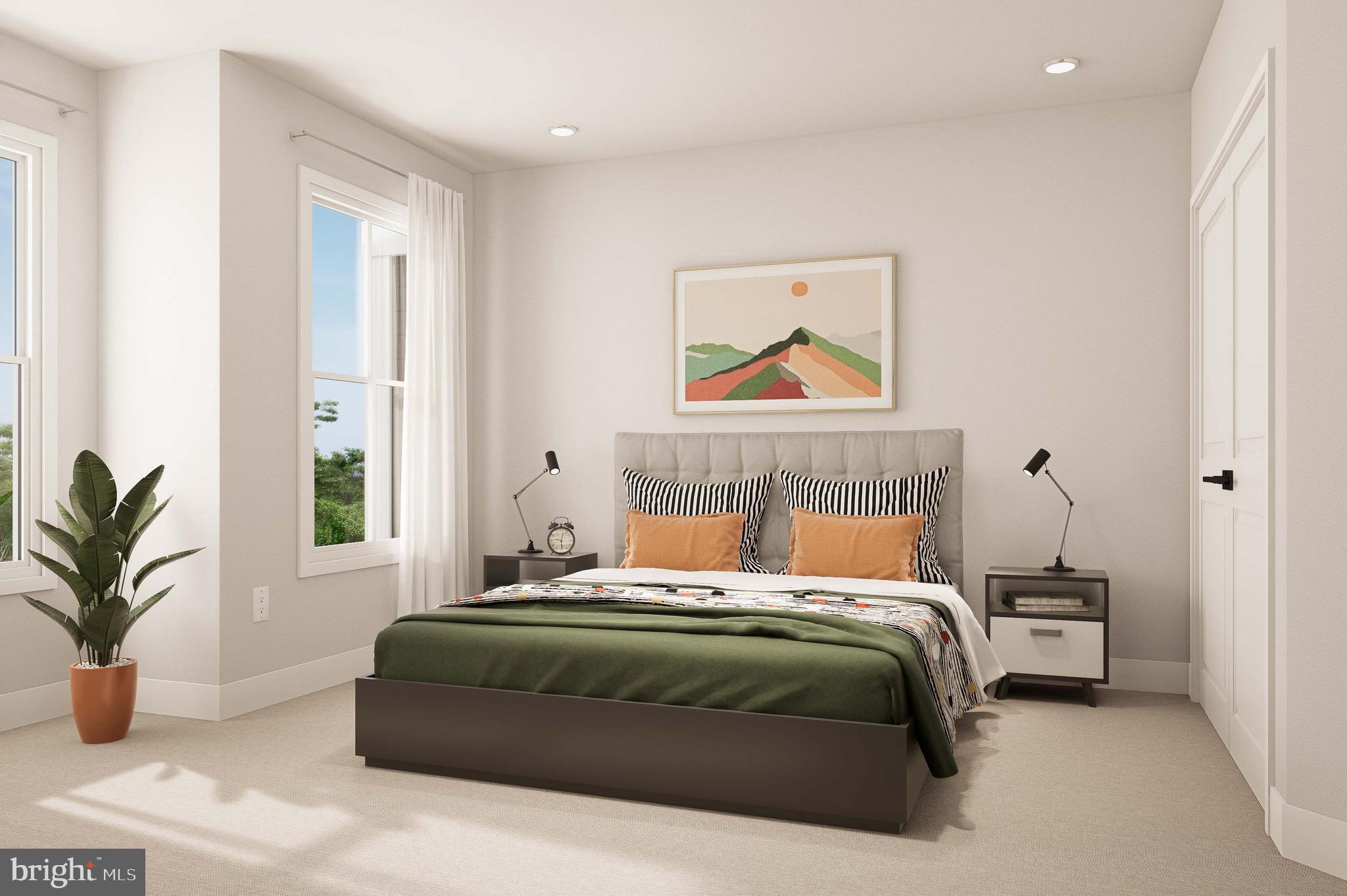 403 Pennybrook Court, Unit 2 Flourtown, PA 19031 - Photo 12 of 19 a bedroom with a large bed and a potted plant