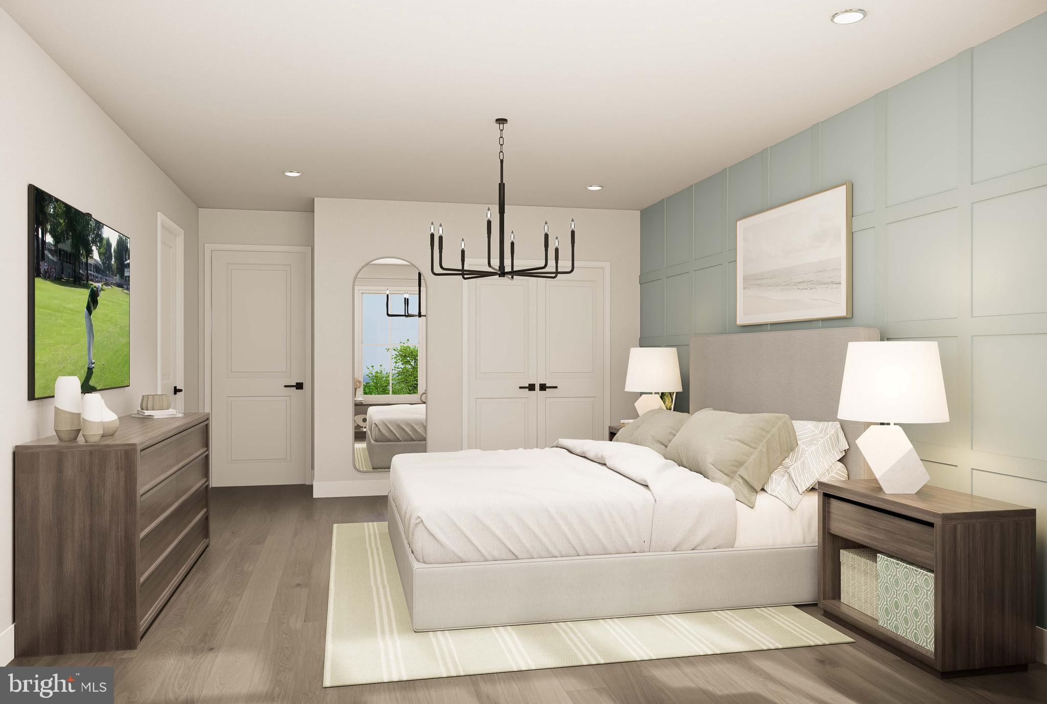 403 Pennybrook Court, Unit 2 Flourtown, PA 19031 - Photo 15 of 19 a bedroom with a bed and a chandelier