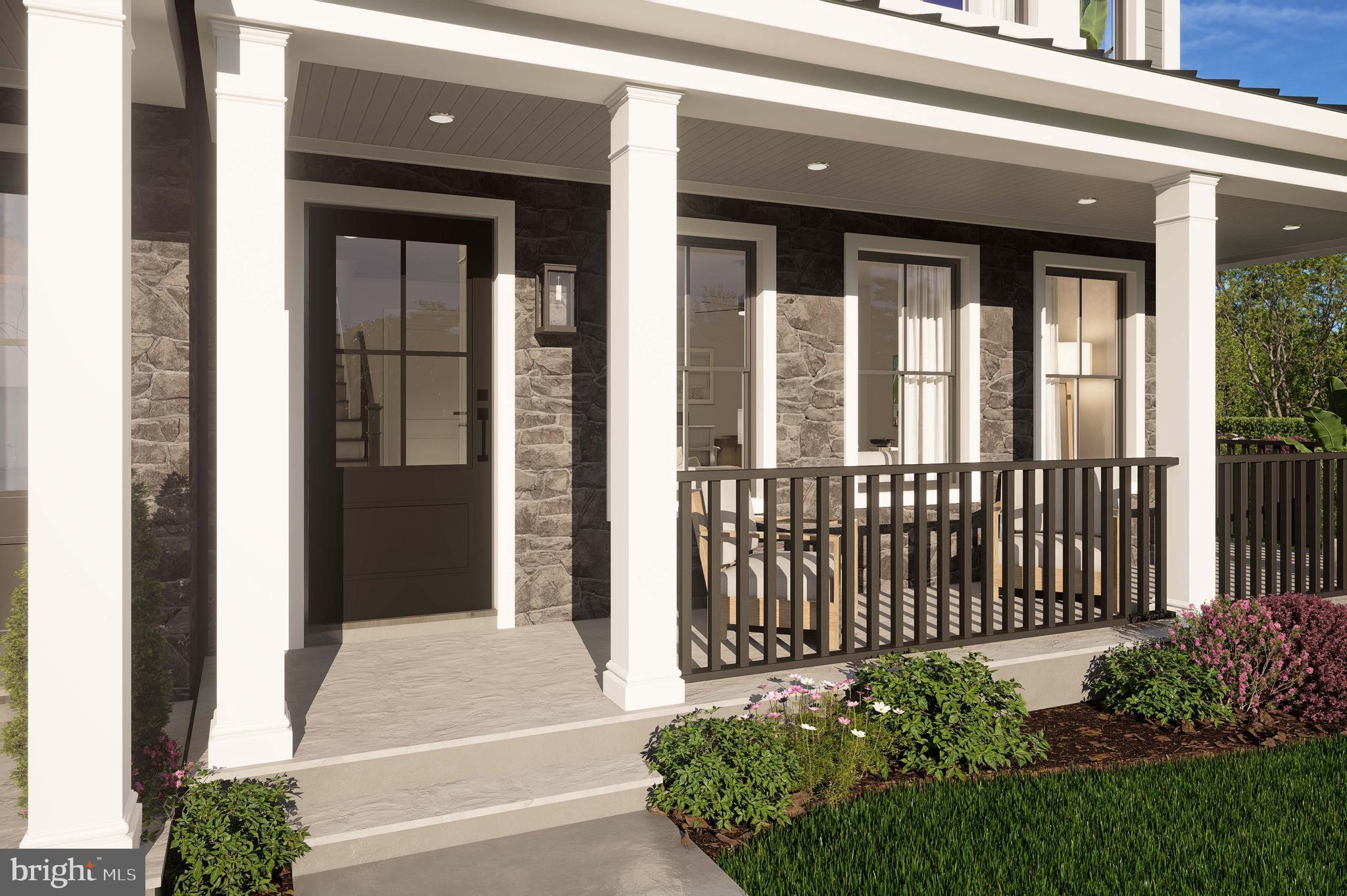 403 Pennybrook Court, Unit 2 Flourtown, PA 19031 - Photo 2 of 19 a front view of a house with a porch