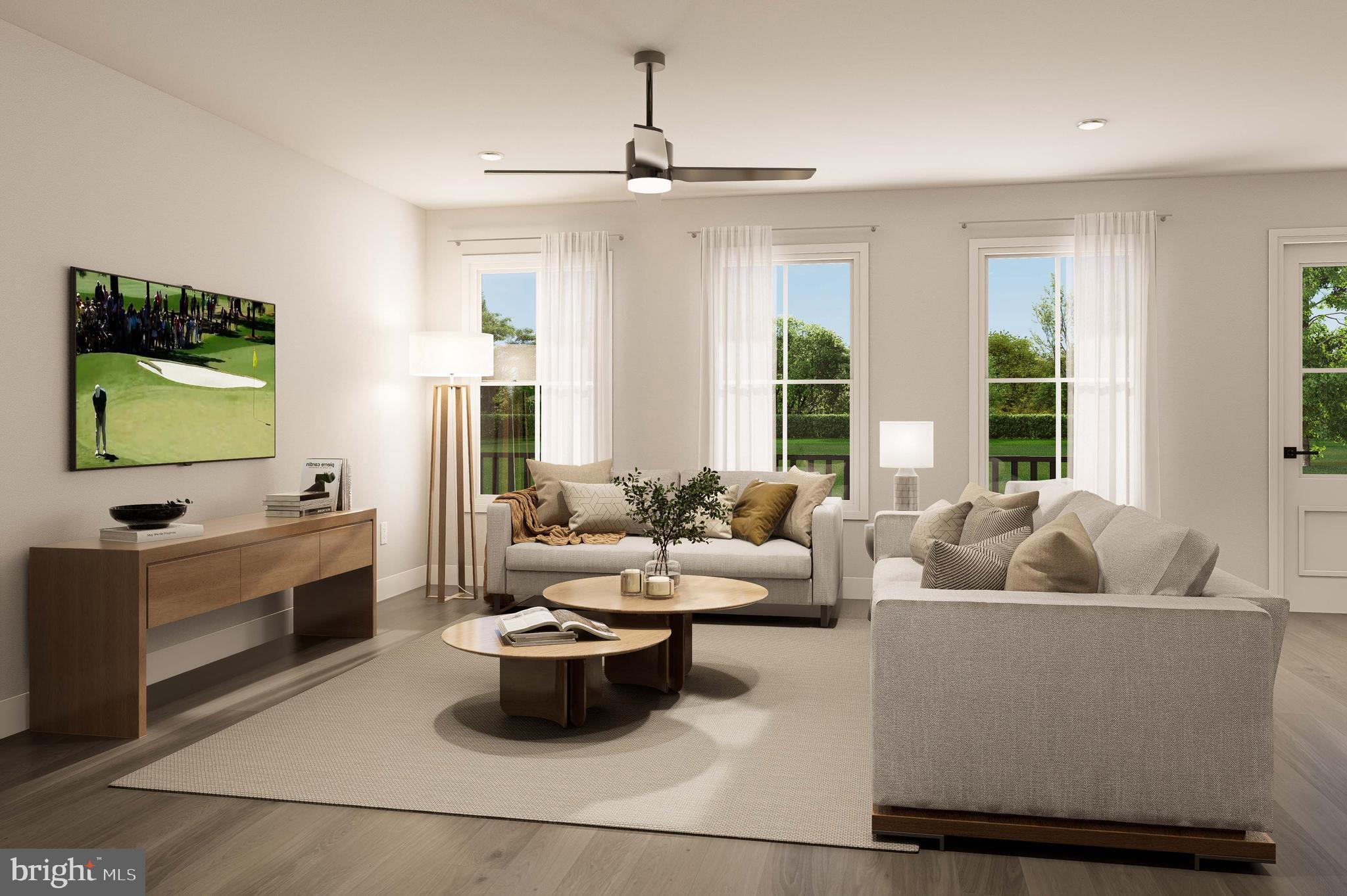 403 Pennybrook Court, Unit 2 Flourtown, PA 19031 - Photo 4 of 19 a living room with furniture and a flat screen tv