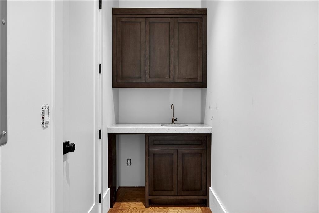 1366 Wessyngton Road Northeast Atlanta, GA 30306 - Photo 12 of 29 a bathroom with a sink and a mirror