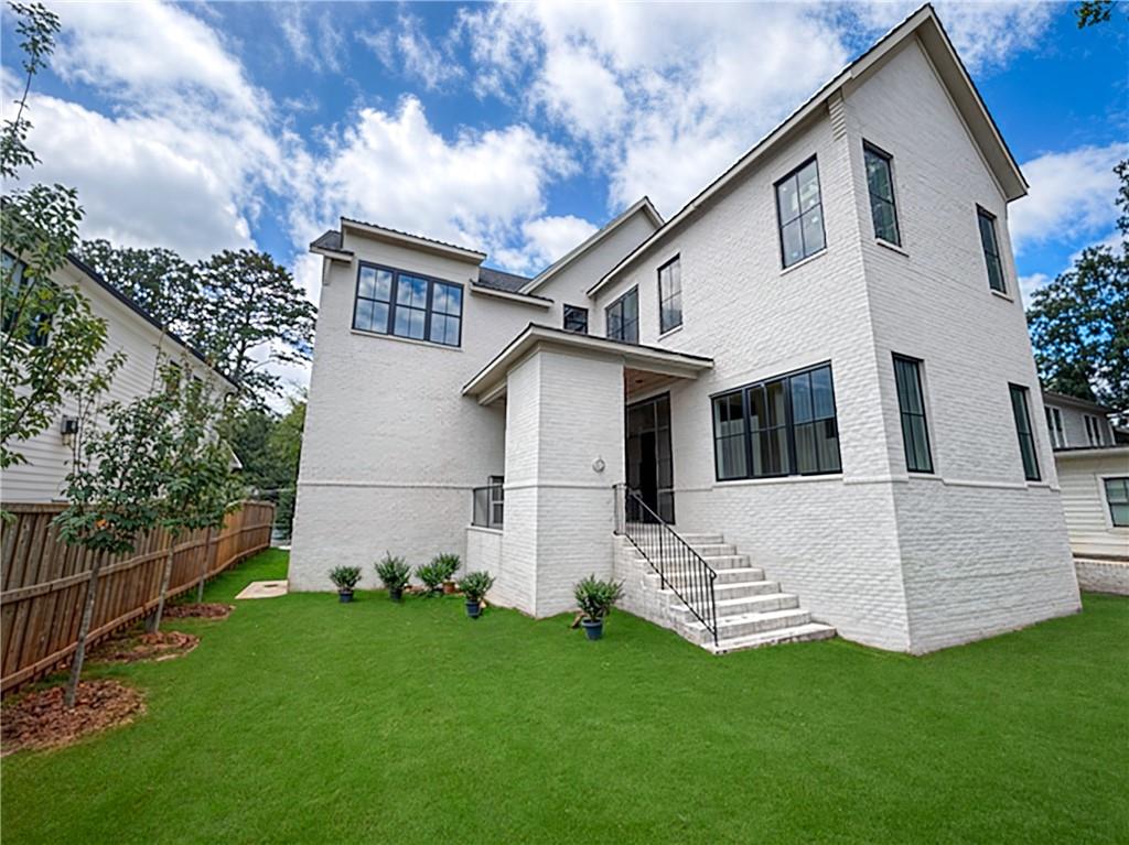 1366 Wessyngton Road Northeast Atlanta, GA 30306 - Photo 2 of 29 a view of house with backyard