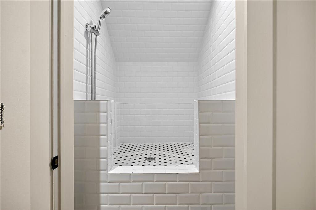 1366 Wessyngton Road Northeast Atlanta, GA 30306 - Photo 21 of 29 a bathroom with a shower