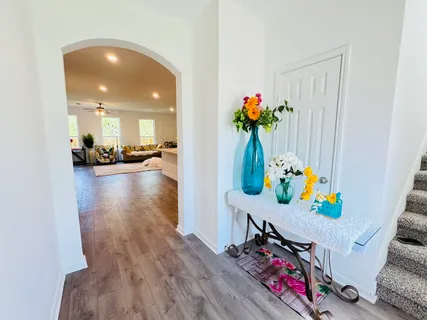 a view of a entryway with wooden floor