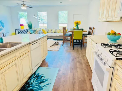 a living room with furniture and a table